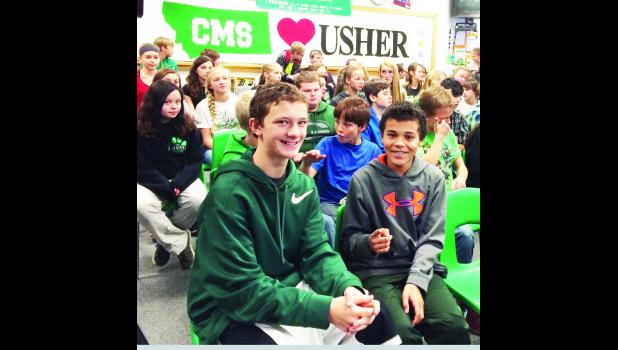 SCN photo by Robert Witham Columbus Middle School students wait for a live video chat with R&B artist Usher on Thursday, Dec. 11. The video chat is part of the Hour of Code program introducing students to the basics of computer programming.