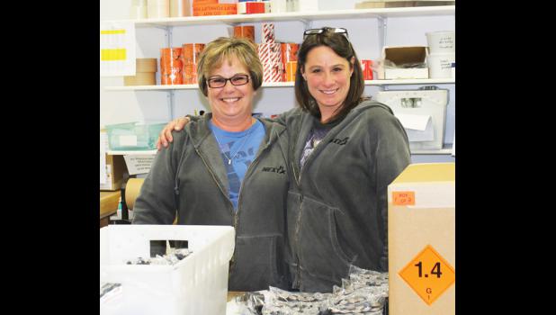 SCN photo by Marlo Pronovost Toni Bokma (left) and Elizabeth “Liz” Frisella (right) ship Next FX’s product all over the world. Bokma said it is the best company in the county to work.