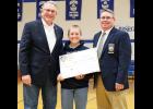Reed Point eighth-grader Cole Bare, center, accepts the second-place Region 3 award from Montana Attorney General Tim Fox, left, and Montana Police Protective Association President Jason Wells, right, at the Reed Point School gym on May 11.