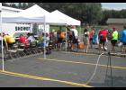 Bikers wait in line for a shower in Absarokee.