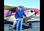 Larry Larson, of Molt, with his Piper PA12 airplane at the Woltermann Memorial Airport on Sept. 10. Larson owns Larson Aerial Patrol, which performs aerial inspections of underground pipelines. His plane was originally built in 1947, and he’s owned it for 39 years. Larson said he often flies to the airport in Columbus.
