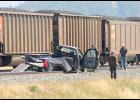 The pickup truck of a Columbus man sits parallel against train cars following a fatal accident last  week.
