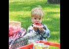 Bodee Gus Williams enjoys some juicy watermelon at the last day of school barbecue.